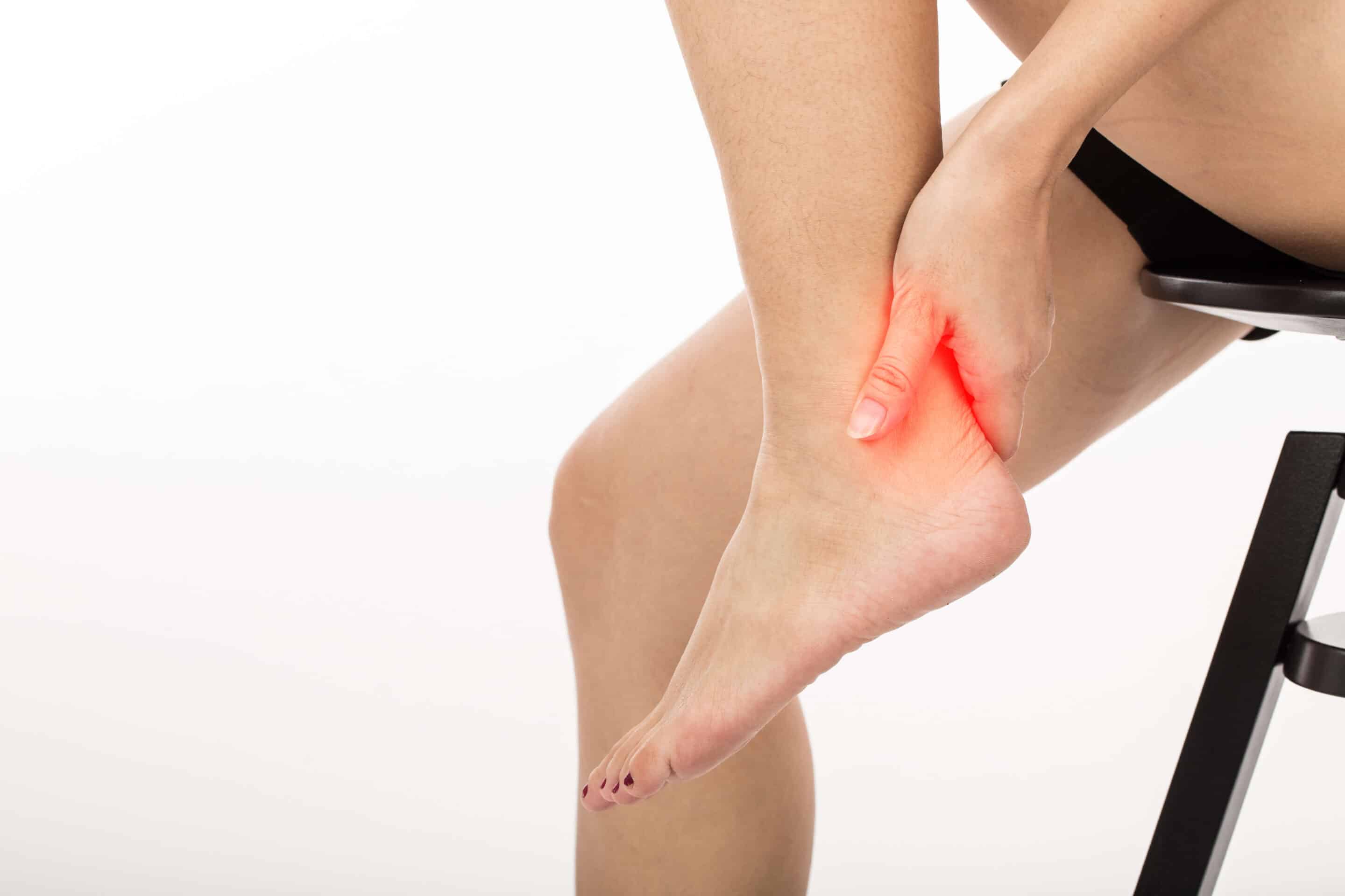 Woman have a heel pain,Isolated on white background